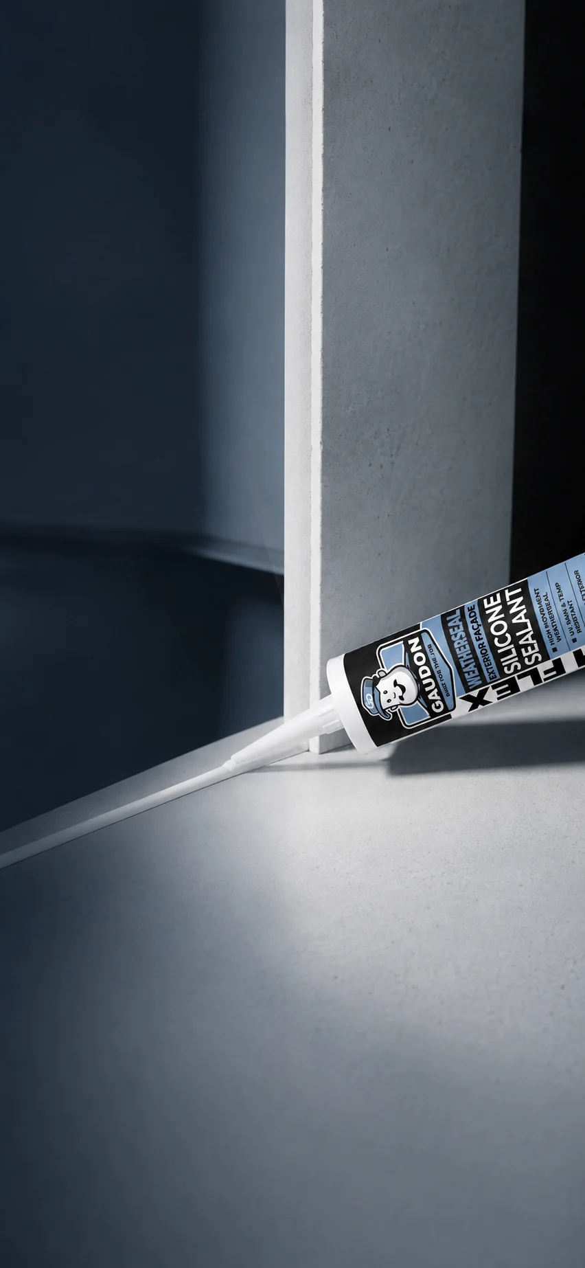 GAUDON Weatherseal exterior facade silicone sealant cartridge laying a white bead along a concrete corner joint